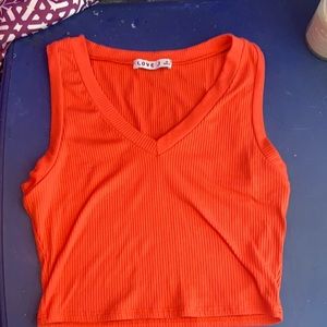 Red-orange cropped tank top